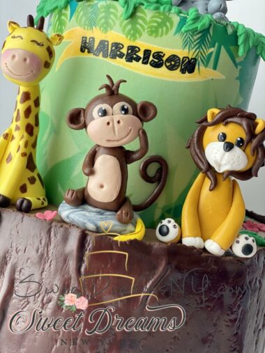 Jungle themed birthday cake for boy safari animal cake giraffe monkey lion fondant cake topper NYC Long Island Custom Cakes
