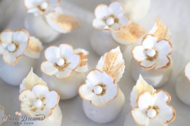 Bridal shower cake pops with white and gold sugar flowers sweet 16 wedding birthday dessert table NYC Long Island
