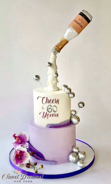 Champagne themed cake Champagne bottle pouring 6oth birthday Cake purple lilach Custom cakes and desserts bakery cake artist Long Island NYC