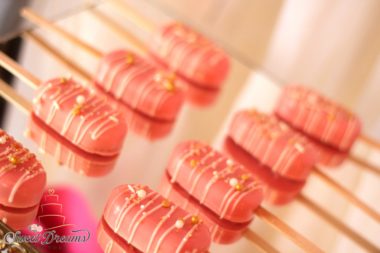 Pink cakesickles bridal shower First birthday bat mitzvah dessert table